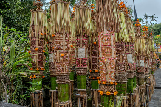 Indonesian statue in a temple with offerings