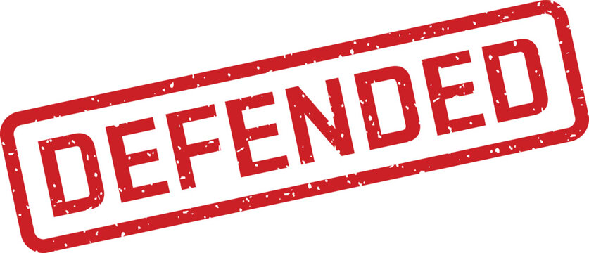 Bold red grunge effect stamp displaying the word DEFENDED in a prominent position on a white surface