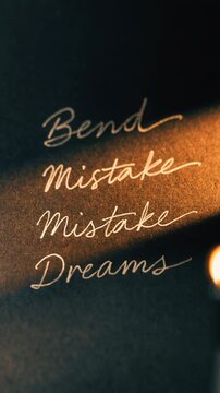 Handwriting cursive word letter message paper, bend mistake dream text handwritten regret hope, emotional message warm candle light creative concept