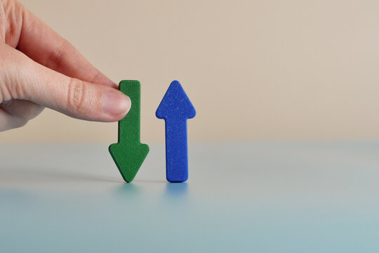 Opposing Arrows Representing Growth and Decline