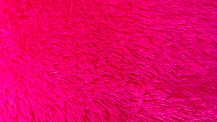 Pink shaggy faux fur texture background full frame (2) © Faried