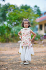 Fototapeta premium Cute indian beautiful little girl in traditional wear