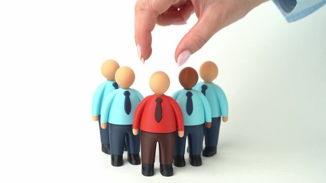 Appointing a new leader for the team. Strong leadership presence and authority in the workplace. Motivation and influence shaping team confidence and corporate direction.
