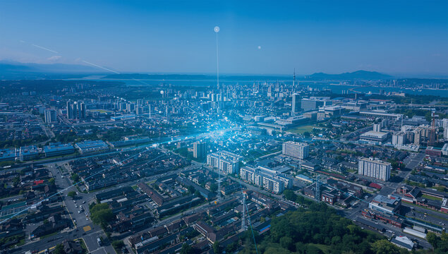 地方都市の上空で青い情報線が地域DXを表す風景