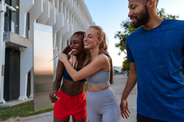 Naklejka premium Diverse friends enjoying active lifestyle together outdoors