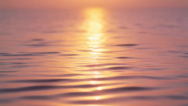 Cinematic Slow Motion Close-up of Golden Sunrise Reflections on Calm Lake Water Ripples, Peaceful Morning Atmosphere Background