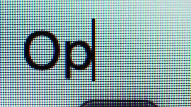 Qingdao,China-Jun.1.2026:A macro shot of a computer screen displaying the lowercase text "Opus"