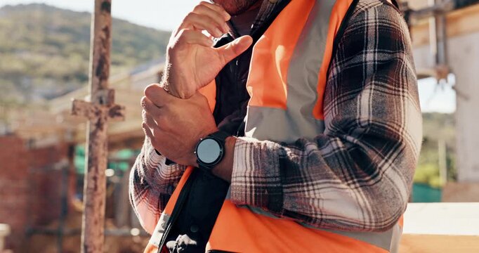 Construction site, man and wrist pain with injury for building, renovation and civil engineering mistake. Contractor, sprain and pressure with industrial accident, architecture or maintenance