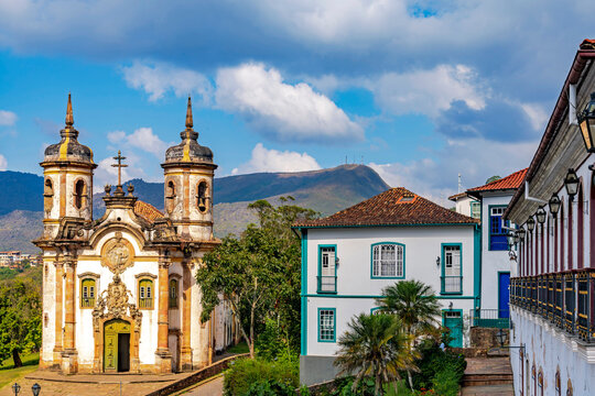 Baroque church and houses with historic colonial architecture in the city of Ouro Preto.