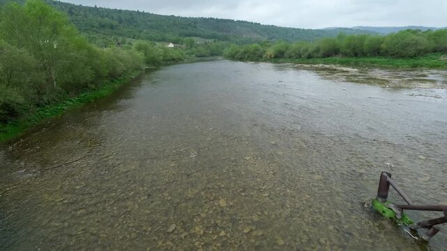 Spring picturesque mountain river band view. (Stryi river near Skhidnytsya village, Carpathians, Ukraine.)
