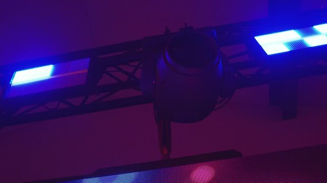 Blue and Purple Stage Lighting Rig with Circular Microphone Shield