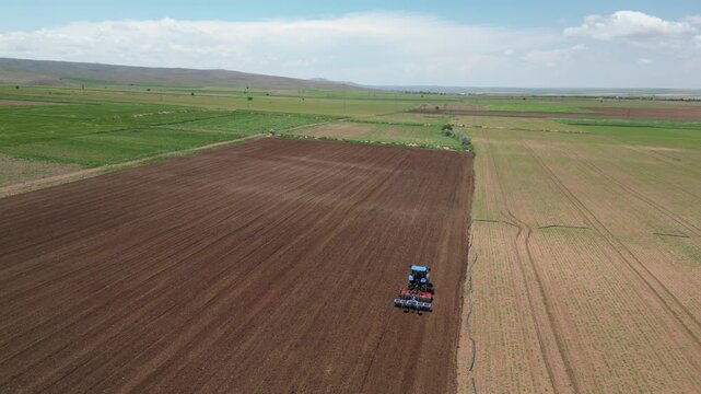 Large fields with a drone_Green fields_Agricultural lands_4K