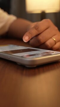 Close-up of a hand scrolling through a social media feed on a smartphone, depicting digital addiction, mindless browsing, and screen dependency in daily life.