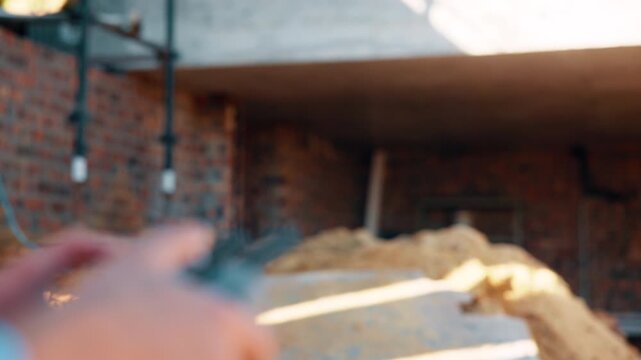 Construction, control or hands outdoor with drone, structure or progress tracking in architecture check. Review, man or engineer with tech, site monitor or industrial evaluation in remote inspection.
