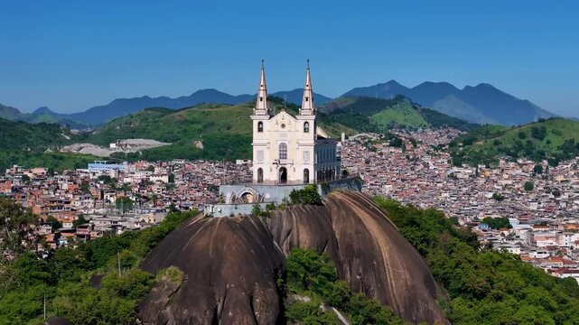 Aerial View of Basilica Sanctuary of Our Lady of Penha Built on a Rock With Views of the Neighborhood Behind in Rio de Janeiro City