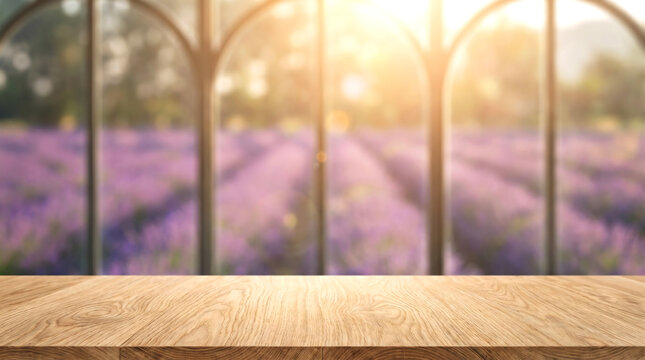 Wood table surface mockup for product presentation in blurred lavender farm background through arched glass windows