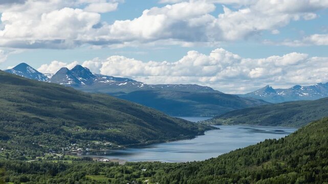 Time lapse of the clouds moving above the  amazing coastline and mountains of Norway.