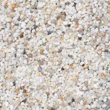 Rice grain beach in Sardinia, Italy. Sand of the beach is composed of small white rounded quartz pebbles.