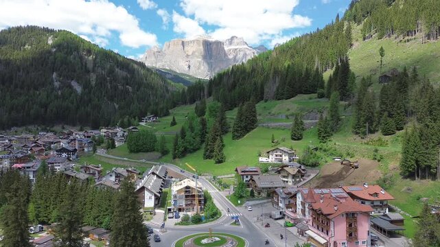 View of the Dolomites from the town of Canazei