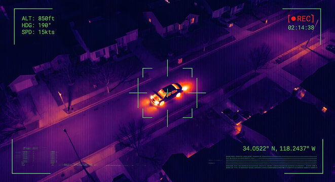 Thermal imaging drone view of car engine heat on night roadThermal imaging drone view of car engine heat on night road