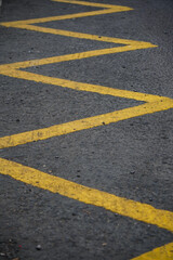 Fototapeta premium Yellow lines on asphalt road.