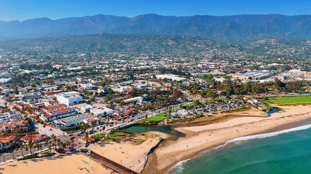Heading to the picturesque shore of Santa Barbara, California, USA. Vast cityscape surrounded by rocks.