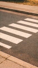 Obraz premium Urban crosswalk textured pavement mobile wallpaper