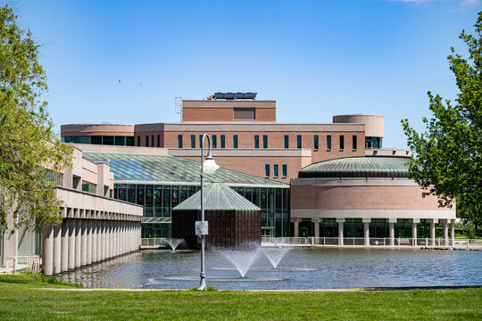 View of Markham Civic Centre with fountains and reflecting pond. Markham, Canada - May 30, 2026.