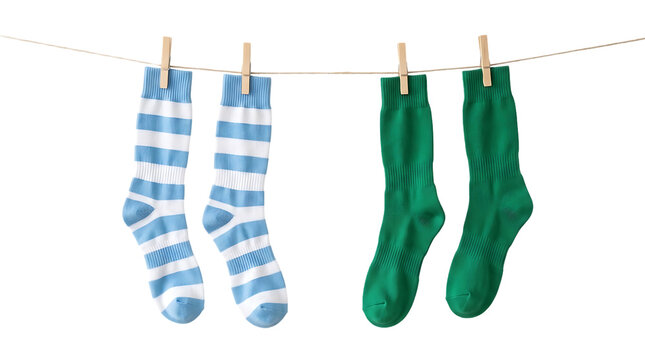 Colorful striped and green socks hanging on clothesline isolated on transparent background