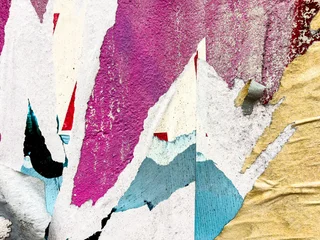 Vintage old posters stuck and torn on the wall in your grunge background © ilolab