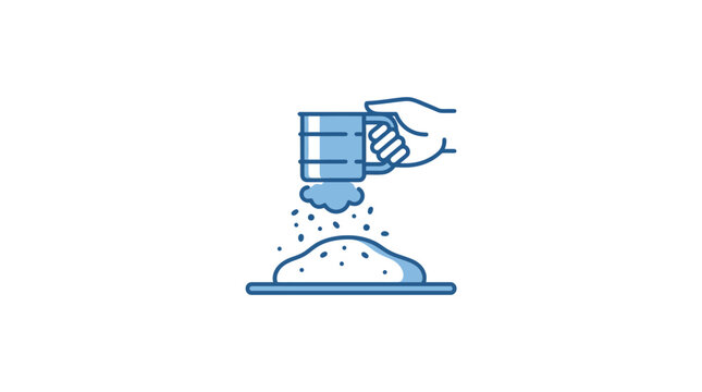 A hand holding a flour sifter over a pile of sifted flour.