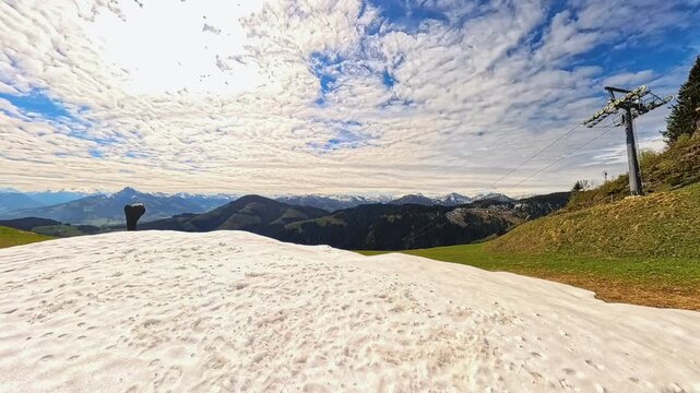 4K Timelapse alpine summer video with moving clouds at Mount Hartkaiser, Ellmau, Kufstein, Tyrol, Austria