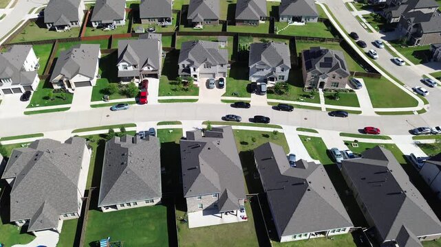 Clustered family homes along Cottle Dr corridor in Arlington, TX show curved streets, fenced yards backyard pool shaping neighborhood layout. Shingled roofs, bright lawns, master planned community