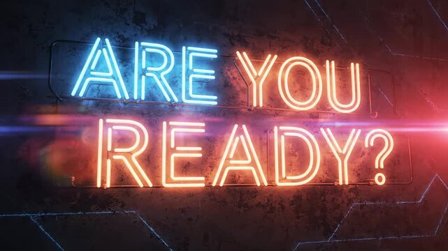 Motivational neon sign on a concrete wall asking the question are you ready.