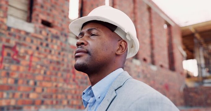 Thinking, engineer and black man at construction site with helmet, property development or building. PPE, architect planning and person with real estate project, safety compliance and problem solving