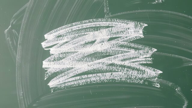 Chalk rubbed out on green chalkboard background