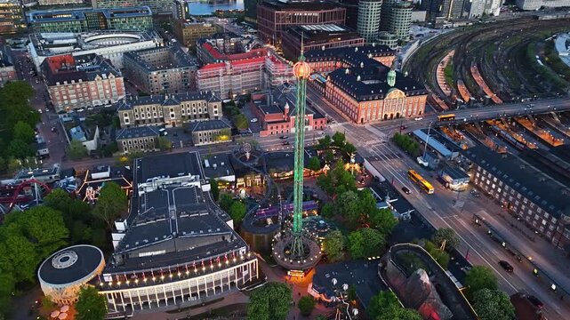 Drone shot of Tivoli Gardens at night in Copenhagen, Denmark