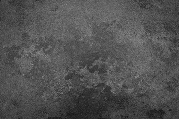 Surface with texture showing gray tones and uneven patterns in a flat layout on a concrete base during daylight hours © Jill Dundee