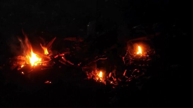 Glowing embers and small flames