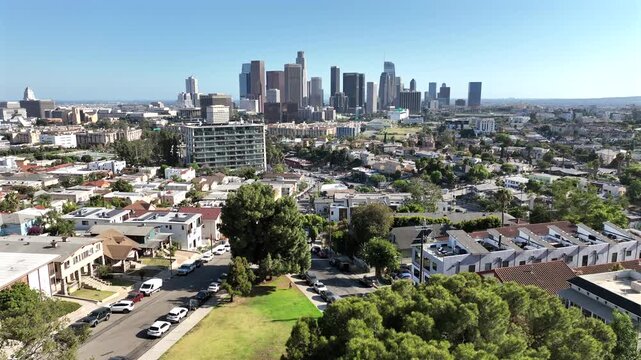 Los Angeles, California, USA - Drone View of DTLA Skyline, High-Rise Commercial Buildings, Residential Neighborhoods, and Everett Park near Echo Park on a Sunny Day