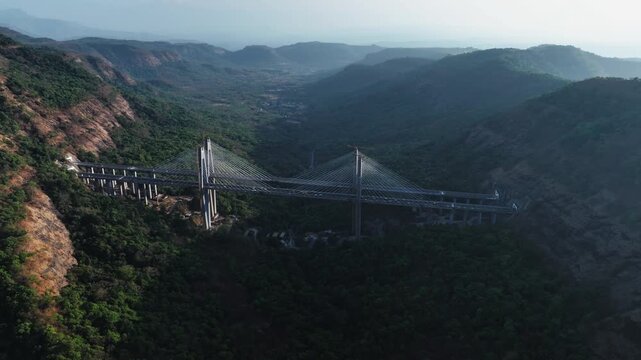 A stunning aerial view of the Mumbai-Pune Missing Link, showcasing one of India&rsquo;s most ambitious expressway projects, cutting through scenic hills and valleys.