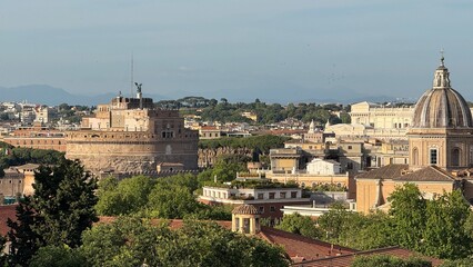 Rome skyline panorama with Castel Sant'Angelo and St Peter's Basilica dome © Jaathaveda