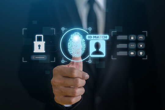 Businessman using fingerprint biometric authentication scan on virtual screen interface, Concept of cyber security, digital identity match, data protection, futuristic privacy and safe tech network