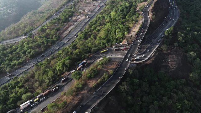 A stunning aerial view of the Mumbai-Pune road via Lonavala, showcasing one of India&rsquo;s most ambitious expressway projects, cutting through scenic hills and valleys.