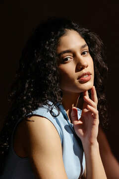 Woman in dramatic studio light