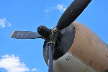 Close Up of Vintage Military Airplane Propeller and Camouflage Engine Hub © William Finn