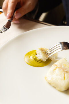 Fish dipped in sauce