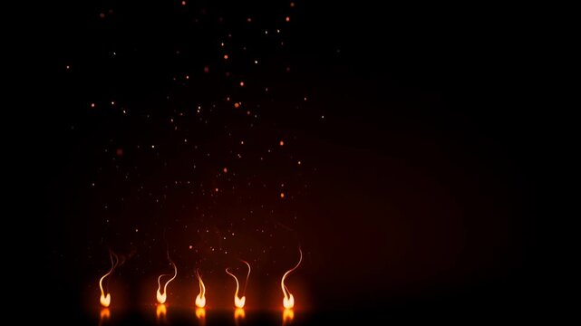 Glowing orange fire sparks and flames with dark background for warmth and energy concept