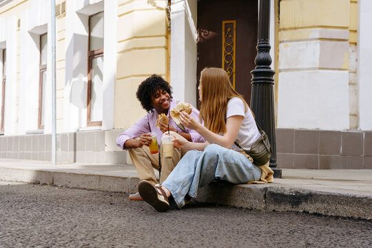 Tourists enjoying street food in city