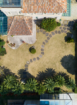 Aerial View of Villa Courtyard With Stepping Stone Garden Path